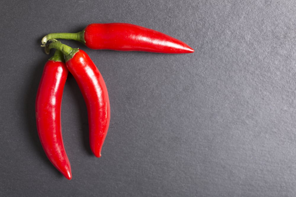 Spicy foods are perfectly healthy during pregnancy, and may even help you get essential vitamins and nutrients.  If you crave spicy food during pregnancy, dig in!
