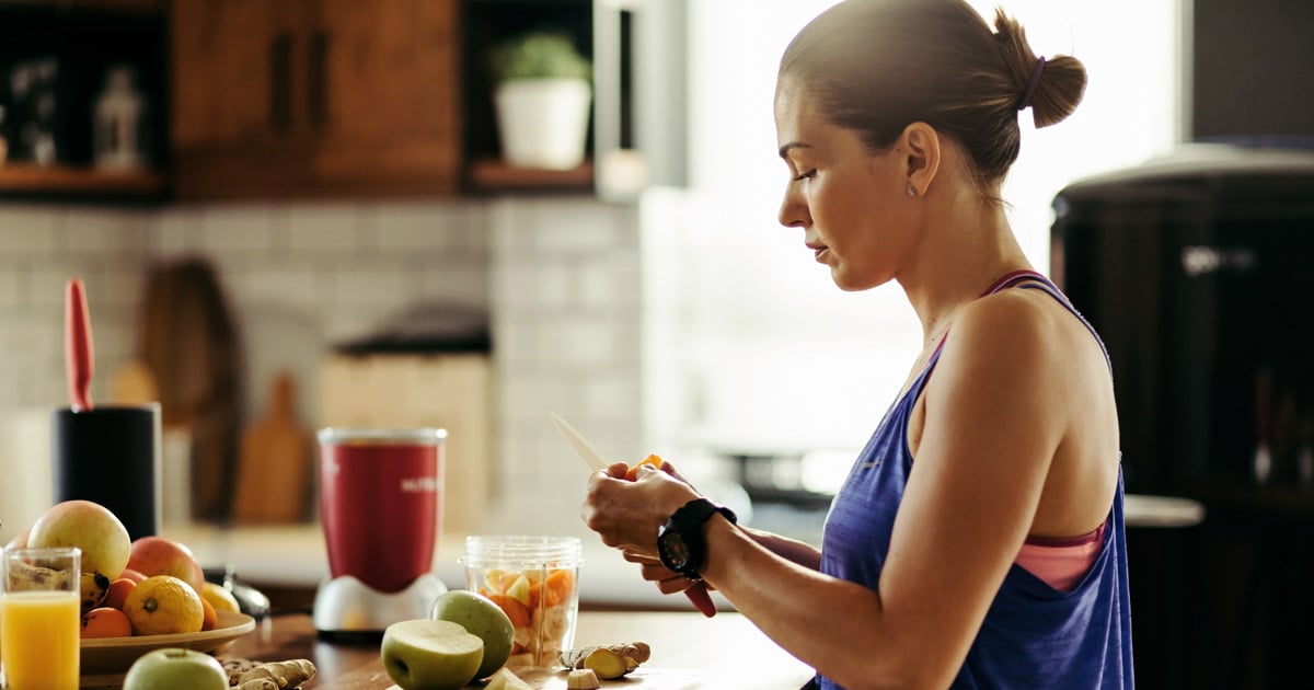 woman prepping fruit